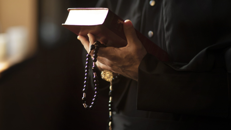 priest-reading-from-bible